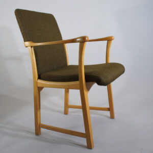 Arm chair in oak and seating in wool. Maker unknown.