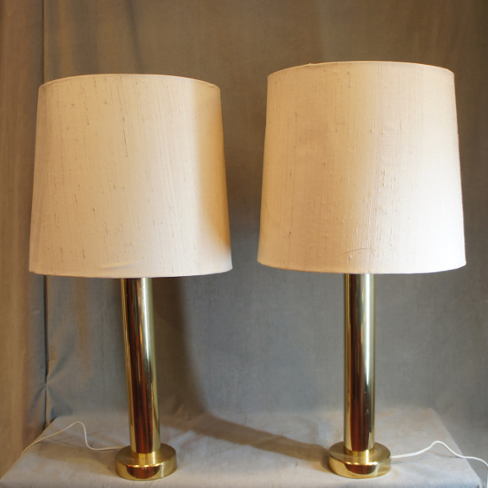 A pair of table lamps in solid brass by Kosta, Sweden. Height 76, diam 38 cm