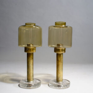 Hans-Agne Jakobsson, Sweden. Candle sticks in brass and glass. Height 31 cm. ljusstakar, mässing, glas, Wigerdals Värld