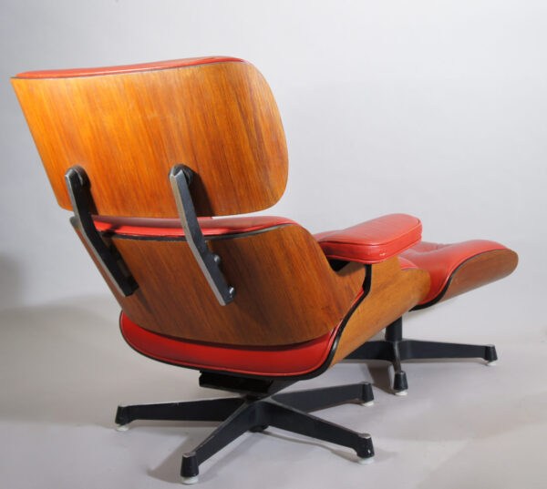 Easy chair with ottoman in teak, seat in leather and base in steel. Swivel funktion. Maker unknown.