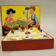 Driving school toy containing a magnetic driven car or motorbike with houses, road signs etc. Perma, Wester Germany 1950. Rare and good condition, parts missing.