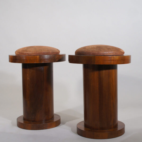 A pair of stools in wood with seats in leather. Maker unknown. Height 45 cm.