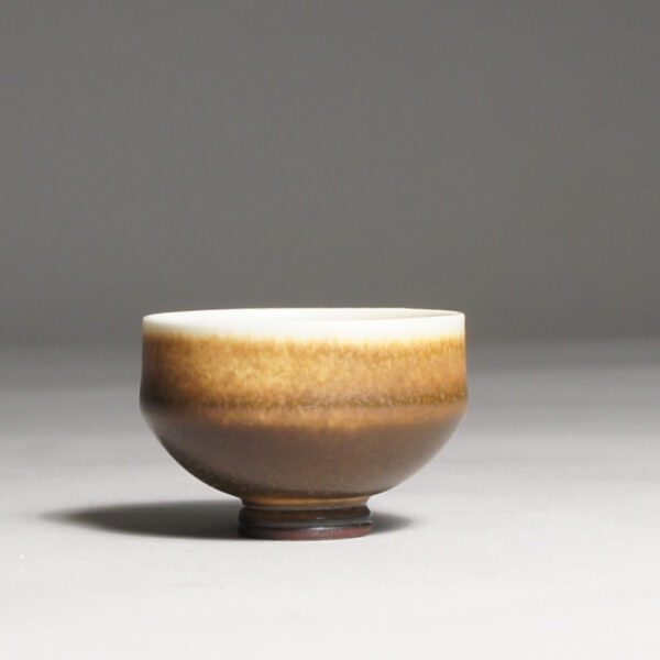 Berndt Friberg for Gustavsberg. Miniature bowl in stoneware with harefur glaze. Height 2,5, diam 2,5 cm.