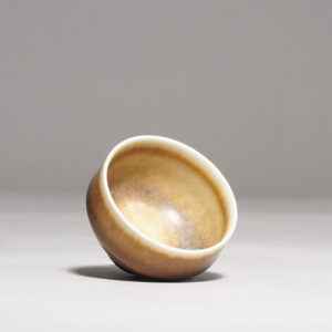 Berndt Friberg for Gustavsberg. Miniature vase in stoneware with harefur glaze. Height 2,5, diam 2,5 cm.