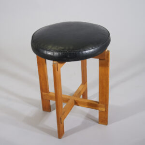 Östen & Uno Kristiansson for Luxus, Sweden. Stool in oak with seat in leather.