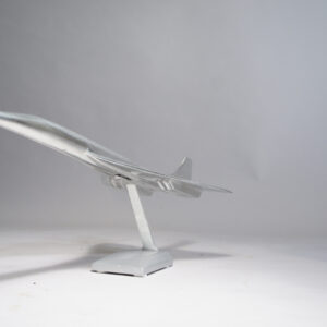 Model of the jet airliner Concorde in aluminium on stand