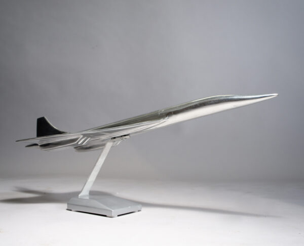 Model of the jet airliner Concorde in aluminium on stand
