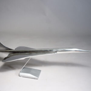 Model of the jet airliner Concorde in aluminium on stand