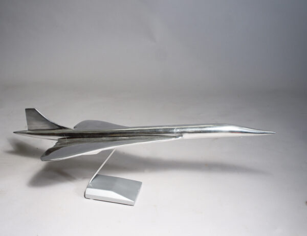 Model of the jet airliner Concorde in aluminium on stand