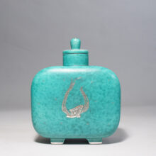 Wilhelm Kåge for Gustavsberg. "Argenta". Urn with lid in green stoneware with decoration in silver paint.