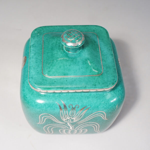 Wilhelm Kåge for Gustavsberg. "Argenta". Urn with lid in green stoneware with decoration in silver paint.