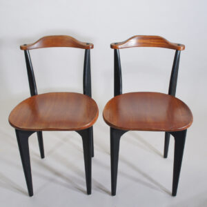 Yngve Ekström for Swedese, Sweden. 1954 "Thema". A pair of side chairs in teak and painted wood.