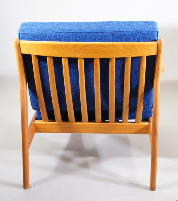 Folke Ohlsson for Dux, Sweden. "USA 75". Easy chairs in teak with new seatings with vintage wool fabric and new rubber bottom.ljer