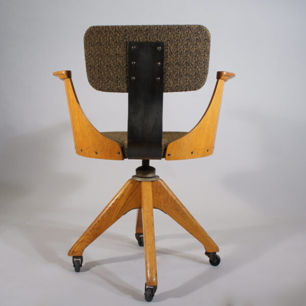 Deskchair in oak and new upholstered seat and back. 1920's. Maker unknown.