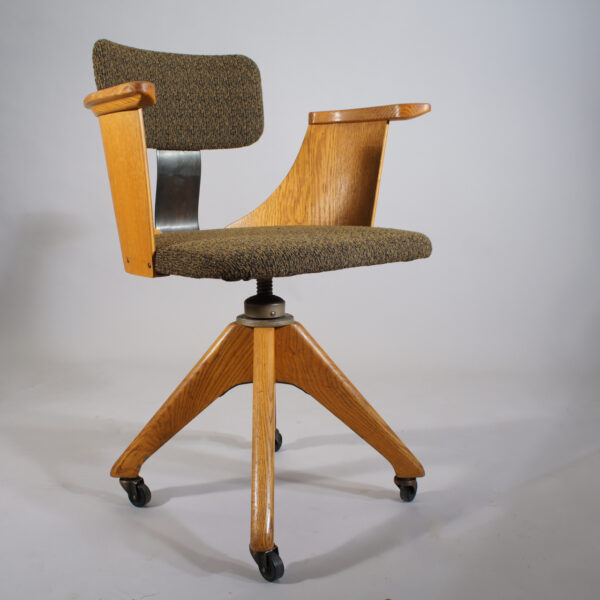 Deskchair in oak and new upholstered seat and back. 1920's. Maker unknown.