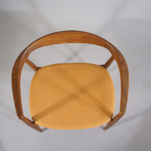 Kai Kristiansen for Ikea 1960s. "Troja". Armchair in solid teak and new seat in leather.