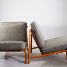 Alf Svensson for Dux, Sweden. "Domus". A pair of easy chairs i teak with new upholstered seatings.