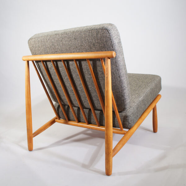 Alf Svensson for Dux, Sweden. "Domus". A pair of easy chairs i teak with new upholstered seatings.