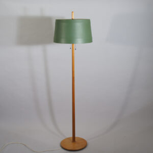 Floor lamp in teak with shade in metal. Sweden 1960's. .