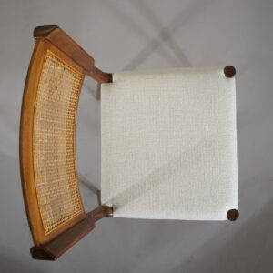 4 dining chairs in teak and rattan.