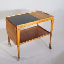 Yngve Ekström "Thea". Serving trolley in teak and laminate on wheels. Serveringsvagn.