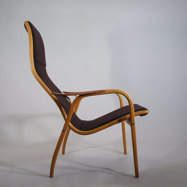 Yngve Ekström for Swedese, Sweden. Lamino. Easy chair new upholstered with wood in oak and teak.