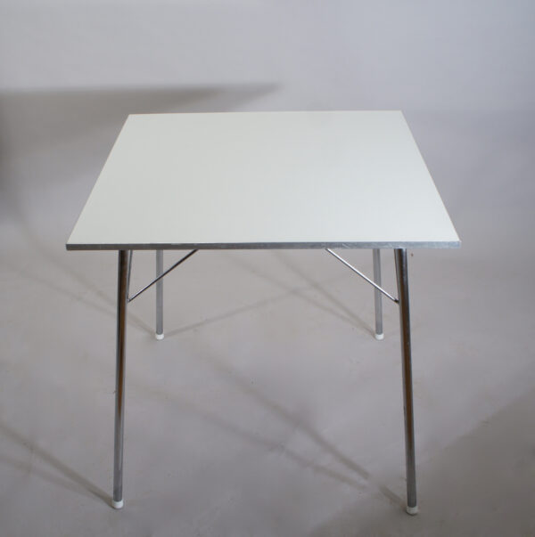Café table by Piet Hein Bruno Mathsson Arne Jacobsen for Fritz Hansen, Denmark. Table top in laminate with edge in aluminium. Legs in crome steel. 70x70x70 cm. Cafébord. Superelips. Wigerdals Värld