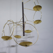 KAIJA AARIKKA & TIMO SARPANEVA for Arikka, Finland. "Mobile-Tulitus". A ceiling mobile in wood and brass. Takmobil takkrona Wigerdals