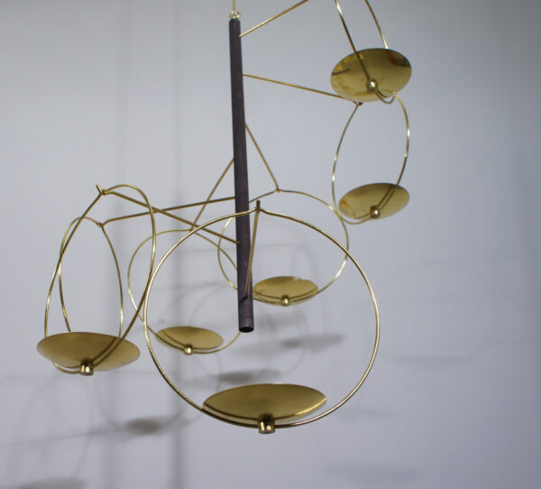 KAIJA AARIKKA & TIMO SARPANEVA for Arikka, Finland. "Mobile-Tulitus". A ceiling mobile in wood and brass. Takmobil takkrona Wigerdals
