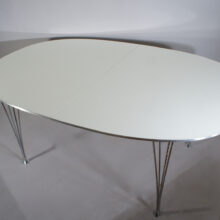 Piet Hein & Bruno Mathsson for Fritz Hansen. "Superellips". Dining table with laminate top, edge in aluminium and legs in crome steel. One extension board.Matbord med iläggsskiva. Wigerdals Värld