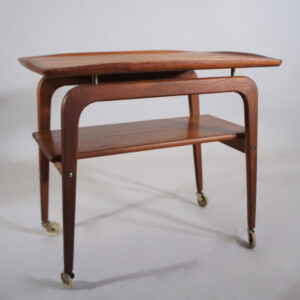 Arne Hovmand Olsen for Mogens Kold, Denmark. Serving cart in teak with details in brass. Serveringsvagn i teak. Wigerdals