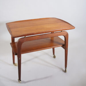 Arne Hovmand Olsen for Mogens Kold, Denmark. Serving cart in teak with details in brass. Serveringsvagn Wigerdals