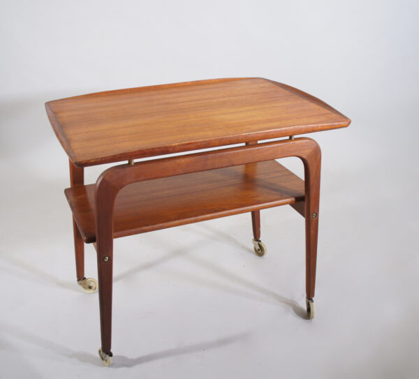 Arne Hovmand Olsen for Mogens Kold, Denmark. Serving cart in teak with details in brass. Serveringsvagn Wigerdals