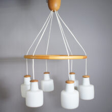 Uno & Östen Kristansson for Luxus, Sweden. Ceiling chandelier in oak and six shades in glass.