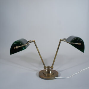 Desk lamp in brass with two arms and shades in glass. 1930's. Tvåarmad Skrivbordslampa i mässing med glasskärmar 1920-tal
