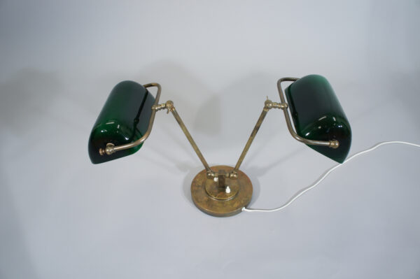 Desk lamp in brass with two arms and shades in glass. 1930's. Tvåarmad Skrivbordslampa i mässing med glasskärmar 1920-tal. Wigerdals