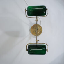Desk lamp in brass with two arms and shades in glass. 1920's.
