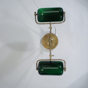 Desk lamp in brass with two arms and shades in glass. 1920's.