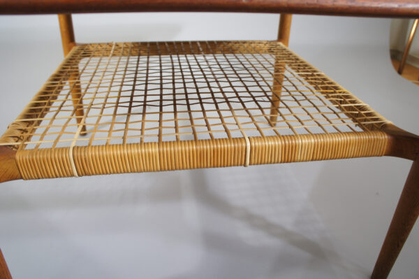 Coffee table in solid teak with rattan. Kurt Østervig for Jason, Denmark. Soffbord i solid teak med tidningshylla i rotting. Wigerdals