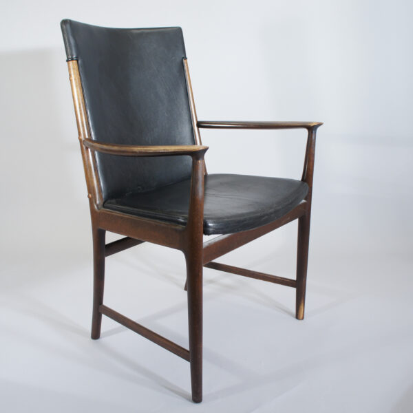 Arm chair in mahogany and leather. Karmstol i mahogny och svart skinn wigerdals.