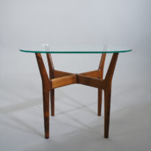 Side table by Illum Wikkelsö in rosewood and glass top. Lampbord