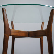 Side table by Illum Wikkelsö in rosewood and glass top. Lampbord i jakaranda och glas