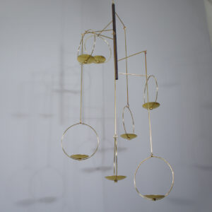 KAIJA AARIKKA & TIMO SARPANEVA for Arikka, Finland. “Mobile-Tulitus”. A ceiling mobile in wood and brass.