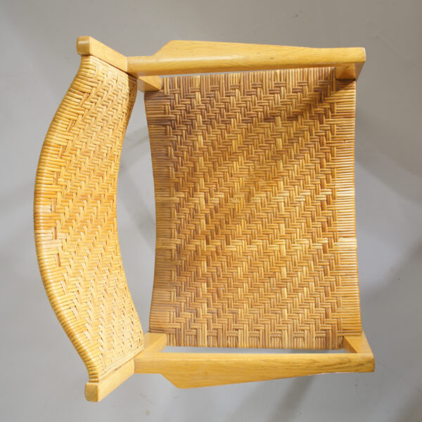 A pair of arm chairs in oak and rattan. karmstolar i ek och rotting. Wigerdals Värld