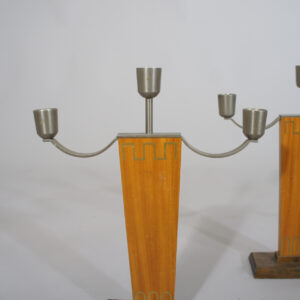 1930' candle sticks in wood and pewter with inlays in brass.