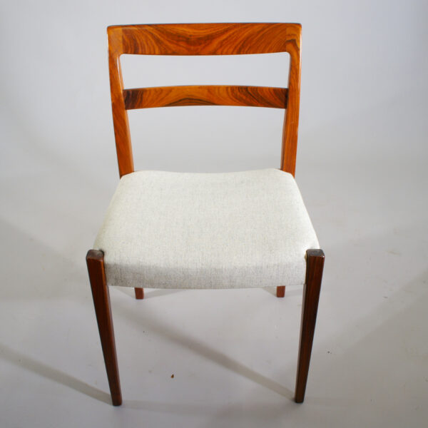 Nils Jonsson for Troeds. 8 side chairs in rosewood with new upholstering. 8 Nylädda matstolar i jakaranda. Wigerdals Värld