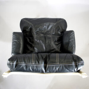 A pair of easy chairs in leather steel rods and canvas. Ett par fåtöljer i skinn, stålrör och kanvas Nordisak galleriet Wigerdals