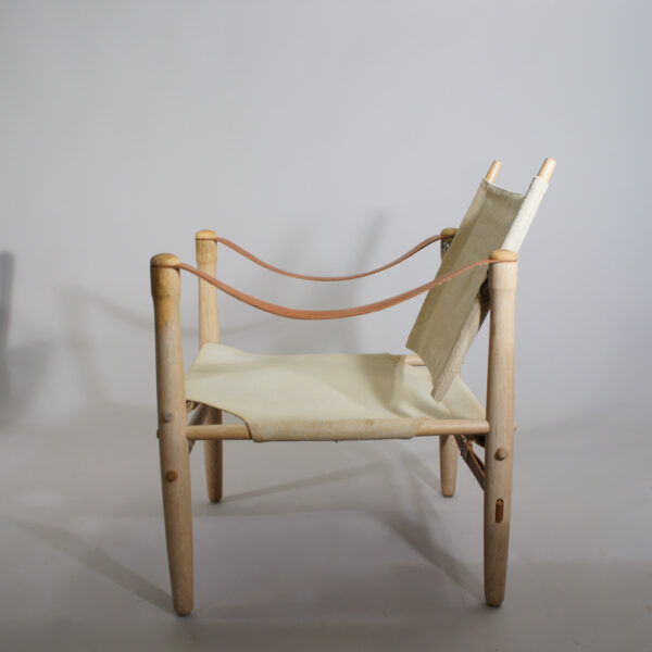 Elias Svedberg for Nordiska Kompaniet. Safari chair in beech, canvas and leather. Safaristol i bok, kanvas och läder. NK Wigerdals Värld