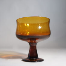 Erik Höglund för Kosta, Sweden brown glass bowl on foot. Bruns skål på fot Wigerdals Värld