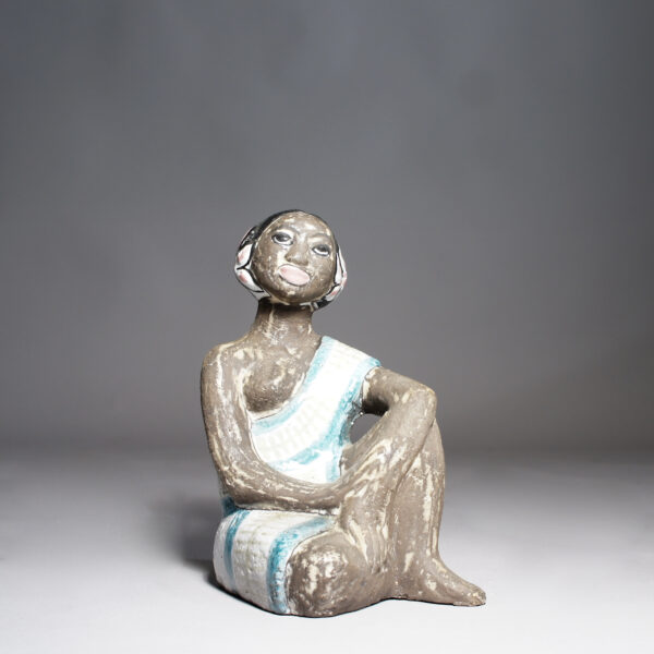 1950's ceramic figurine by Mari Simmulson for Upsala-Ekeby, Sweden. West indian women. västindisk kvinna Wigerdals Värld